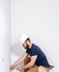 electrician-builder-at-work-installation-of-socke-2023-11-27-05-07-34-utc.jpg - Independent Restoration Services